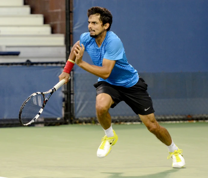 a tennis player prepares to hit a ball