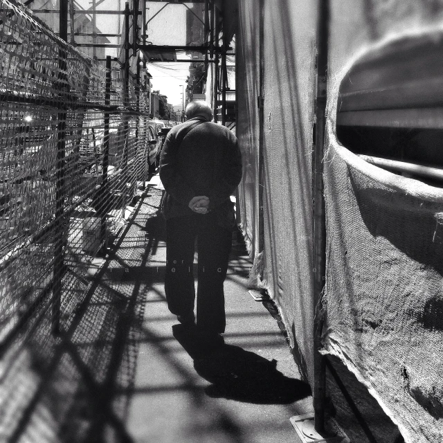 a person on a bicycle on a walkway