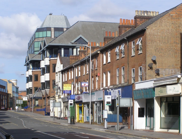 a very long brick row houses on the street