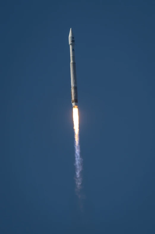 the rocket with its rocket - less end on it lifts off from the ground
