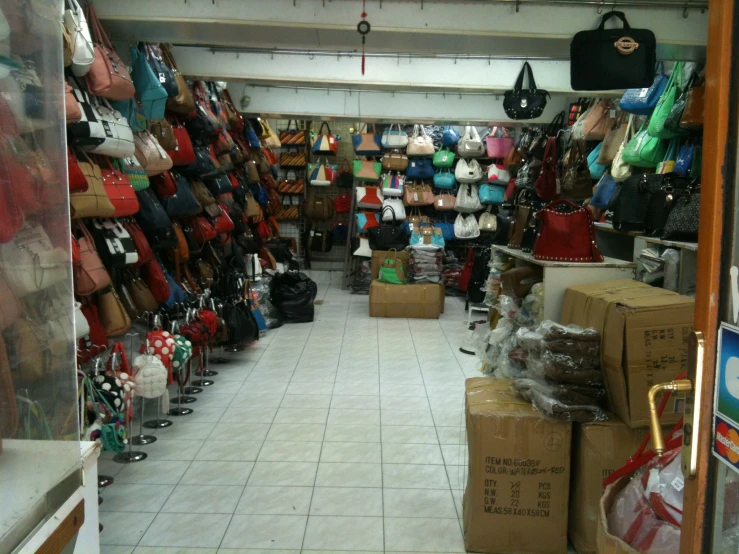 the shop is full of handbags and other items