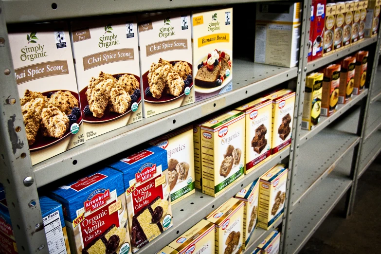 various flavors of cookies and other treats on shelves in a store