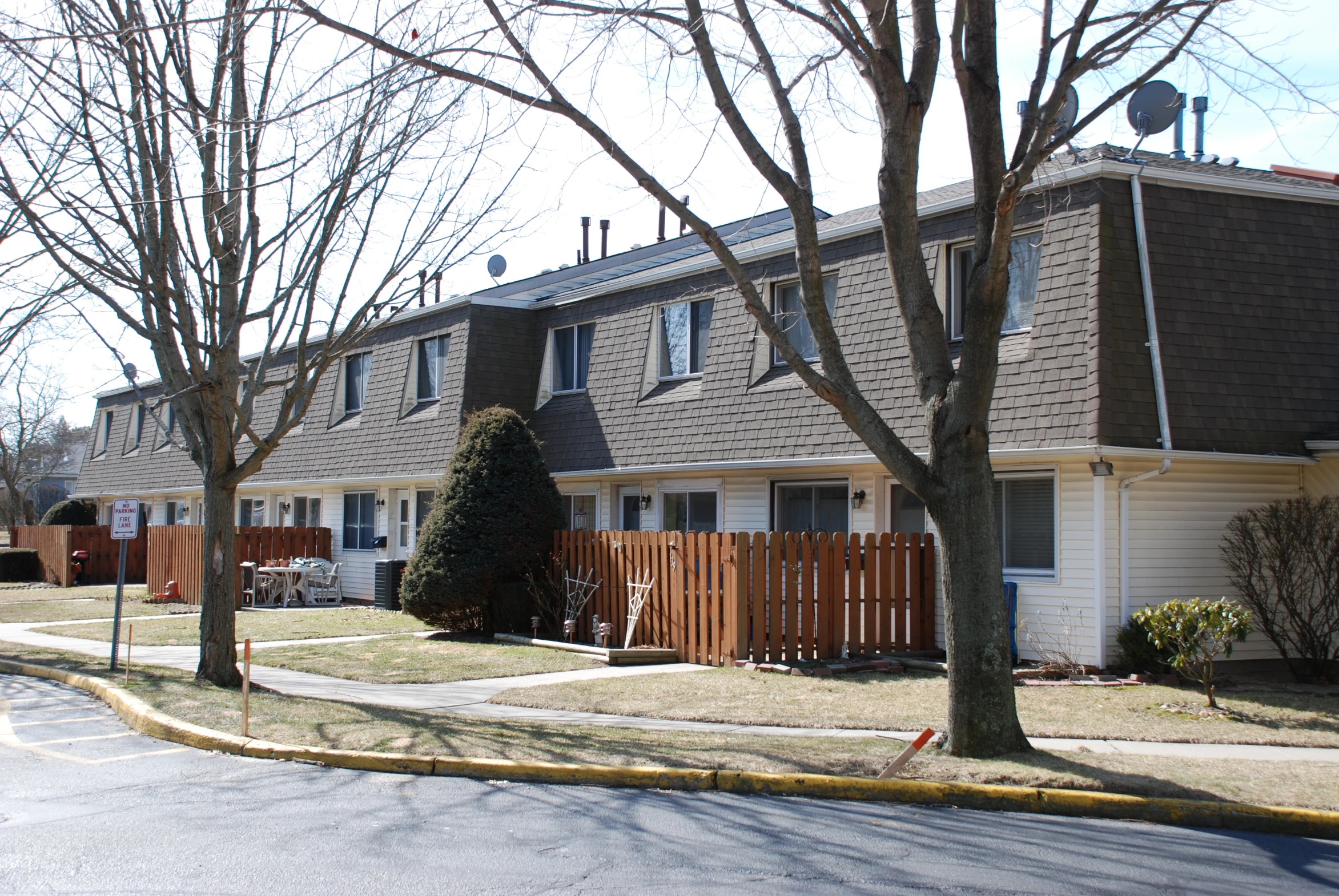 two buildings at a residential complex in the fall