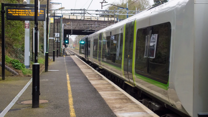 a train parked at a station next to the platform