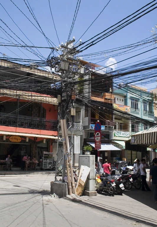 electric wires in the city next to a pole