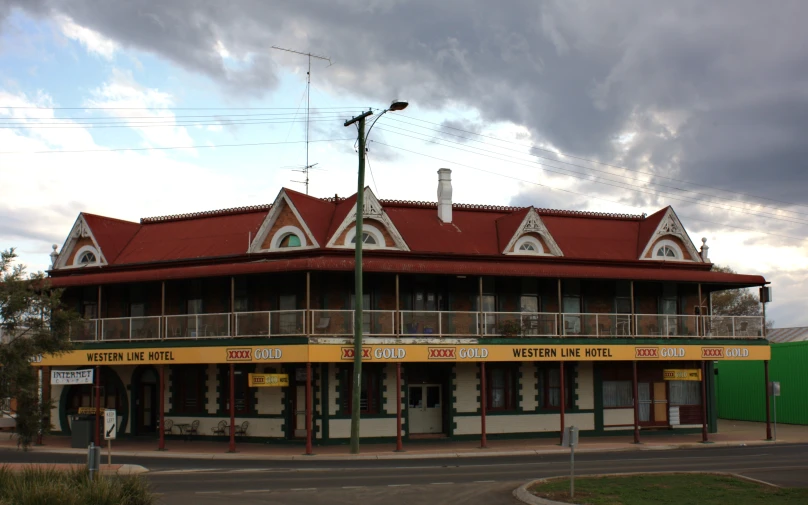 the building has red and white trim around it