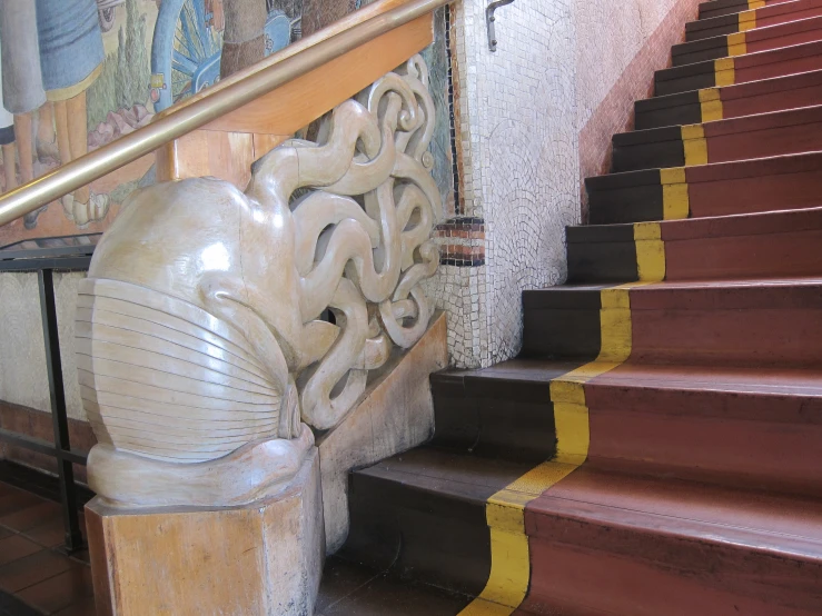 the staircase is decorated in art and architecture