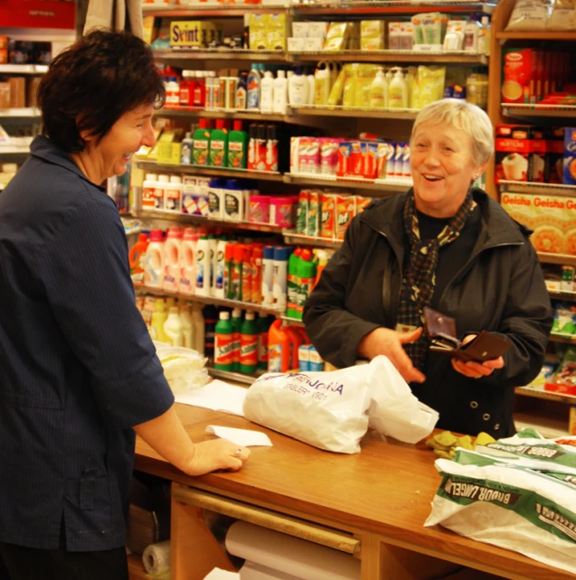 the woman is ordering food to be served to her