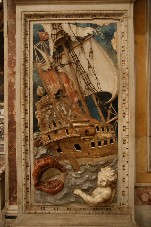 an ancient ship painting in the middle of a wall