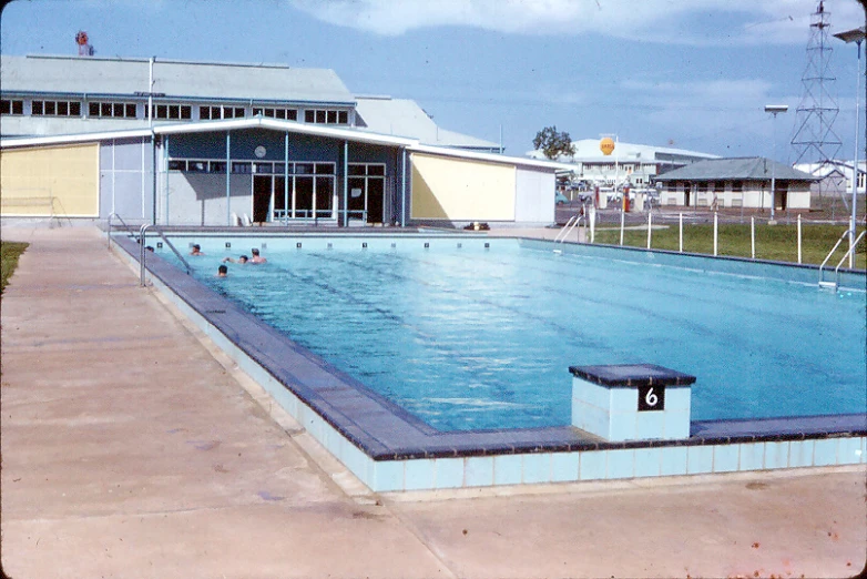 a swimming pool is shown with a sky background