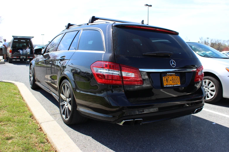 the black van has skis on its roof