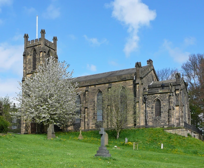 an old church with tall steeples and large windows