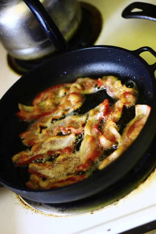 a set with food cooking on a stove top