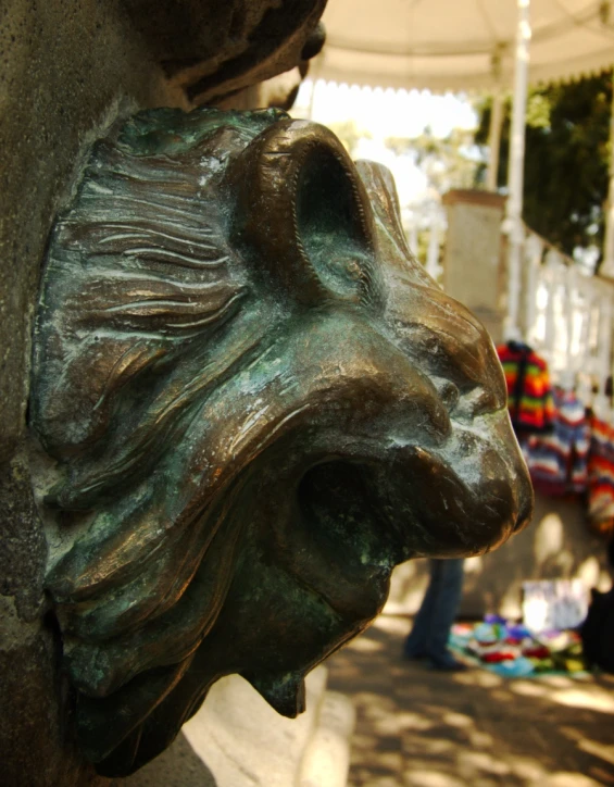 a closeup of the back of a statue