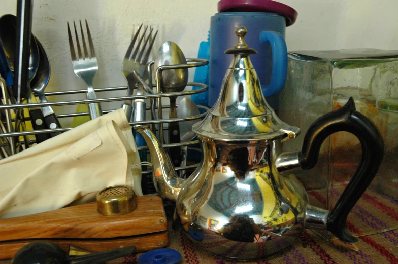 the kitchen utensils have been sitting on a counter