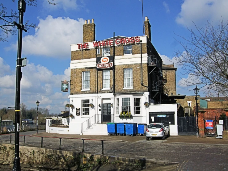 a building with a few signage above the top