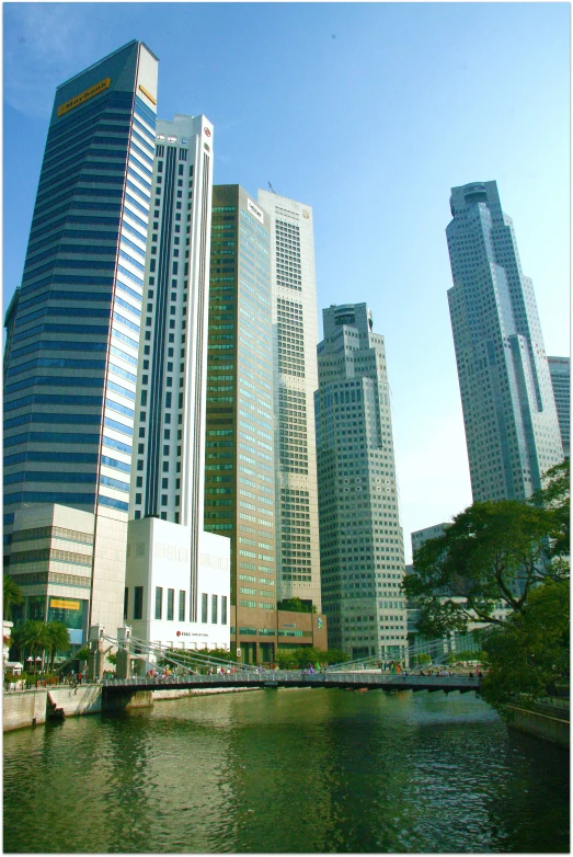 a large building with a bridge in front of it