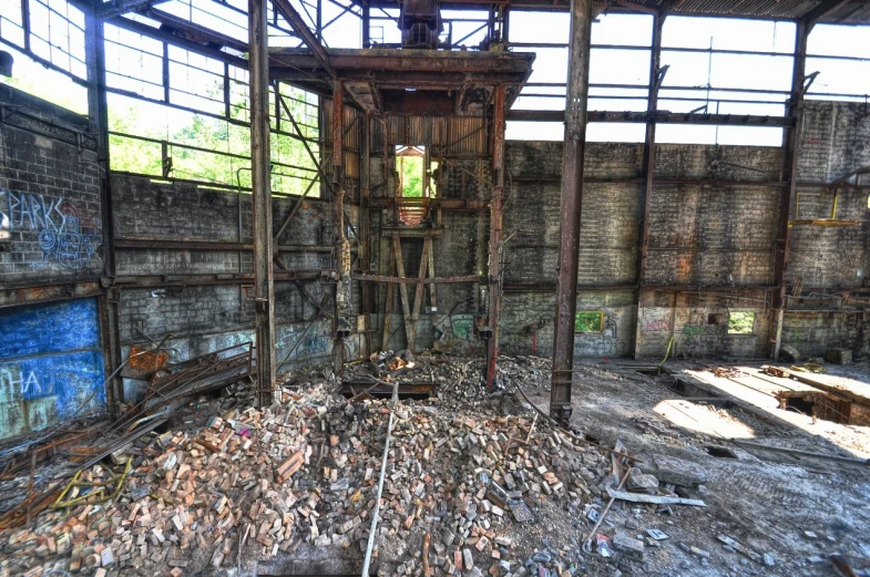 the inside of an abandoned industrial factory building