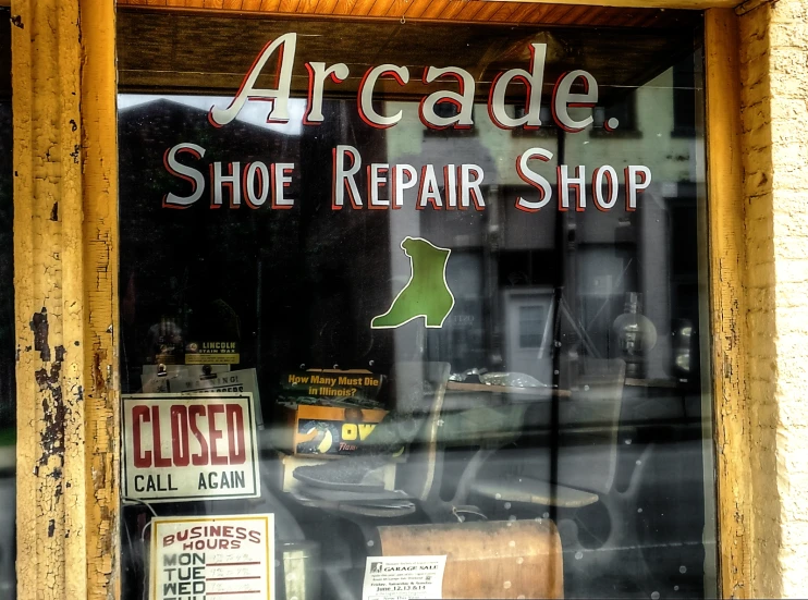 a window with some store signs on it