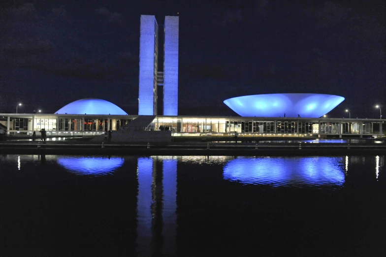 a tall tower in the middle of water