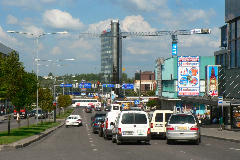 the city has many cars on a busy street