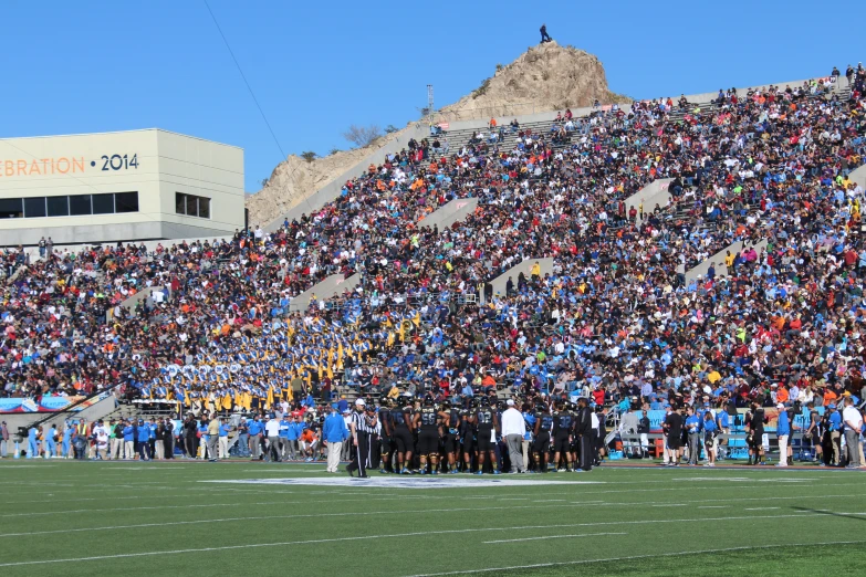 a stadium full of people waiting to be called