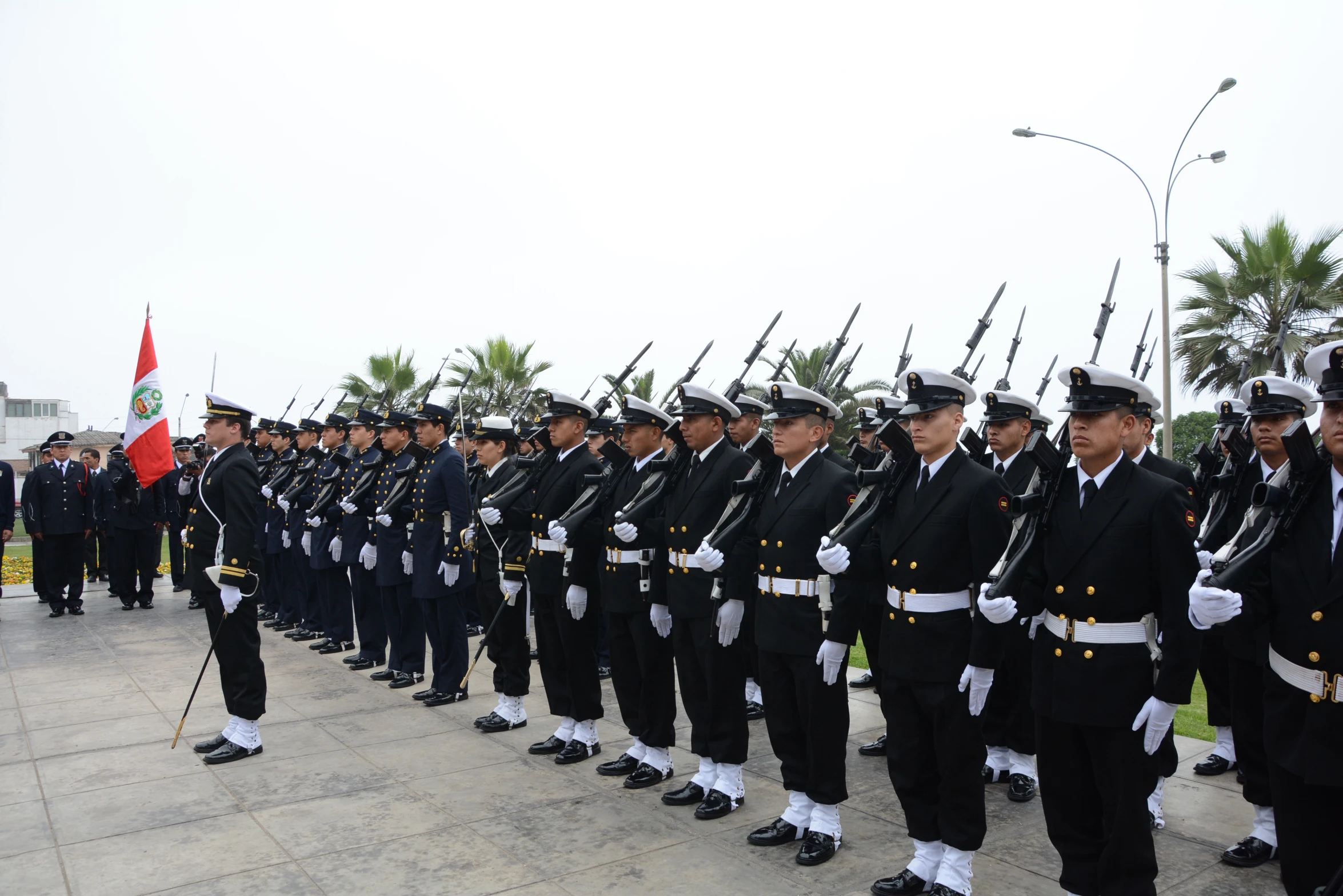 a large group of people in uniform lined up