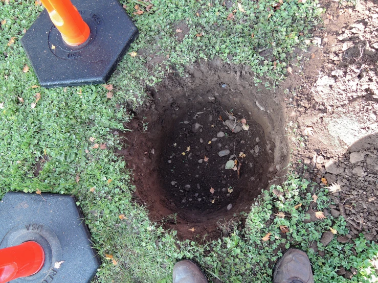 view from above of someone's feet looking down at the ground