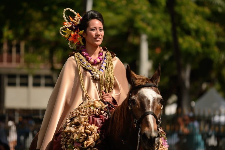 a woman in costume riding on the back of a horse