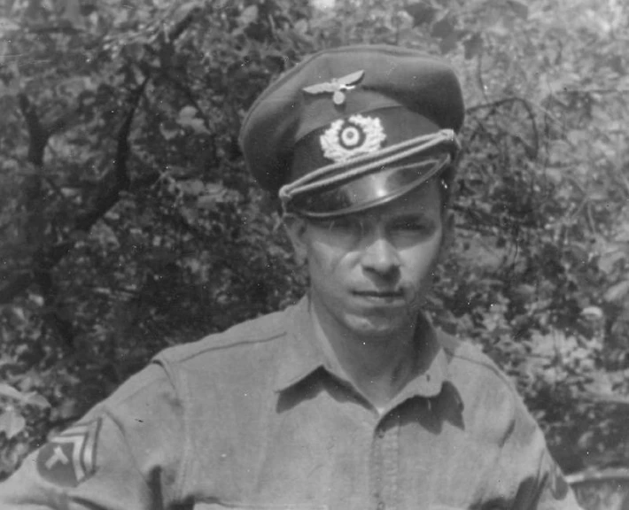 a black and white po of a soldier in uniform