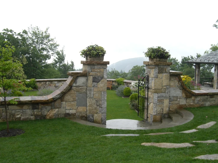 this is an outdoor view of the gates that look like stone