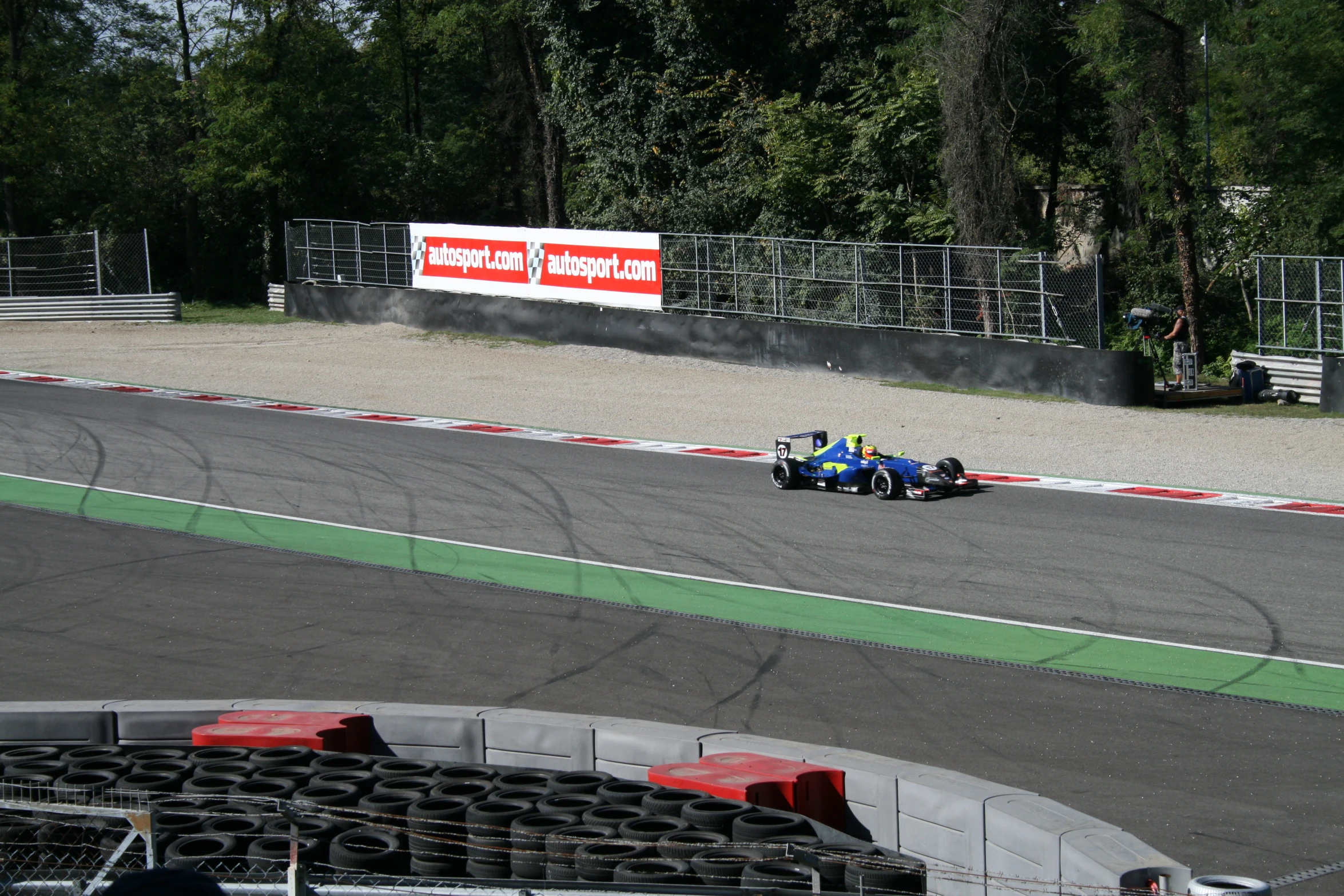 a person racing on the track during the day