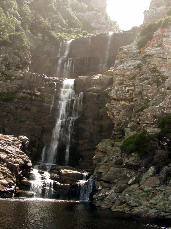 the waterfall has no people in it, but it is majestic