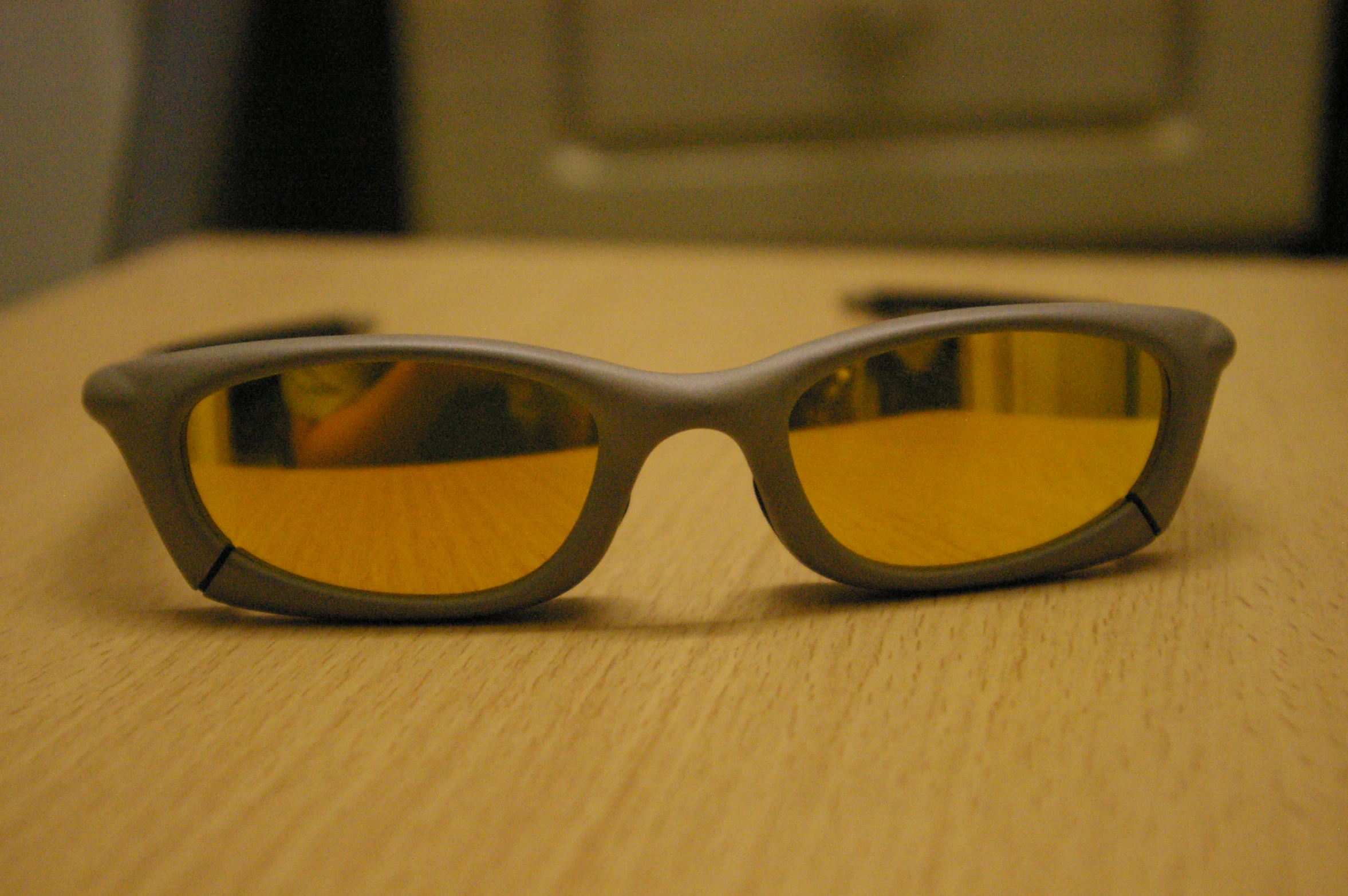 some kind of sunglasses sitting on a table