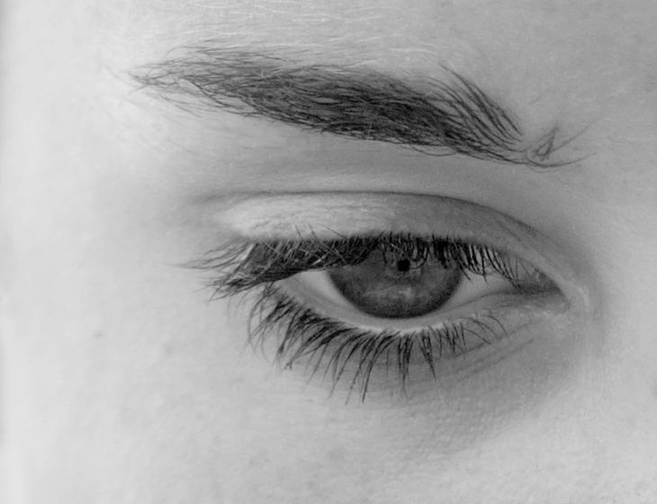 there is a woman's eye that has eyelashes