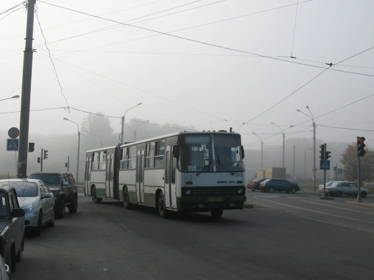 a city bus is driving down the street