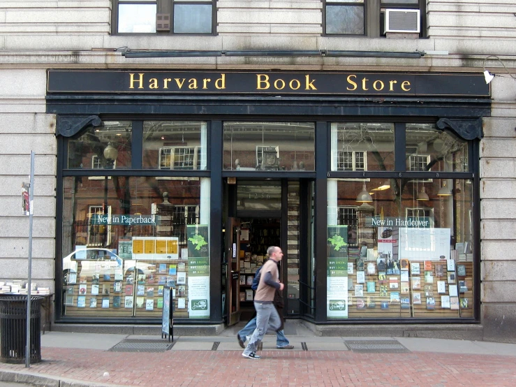 a shop front with the door open showing some books