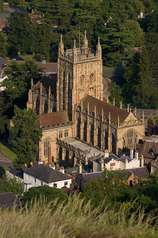 an aerial view of a medieval cathedral and surrounding buildings