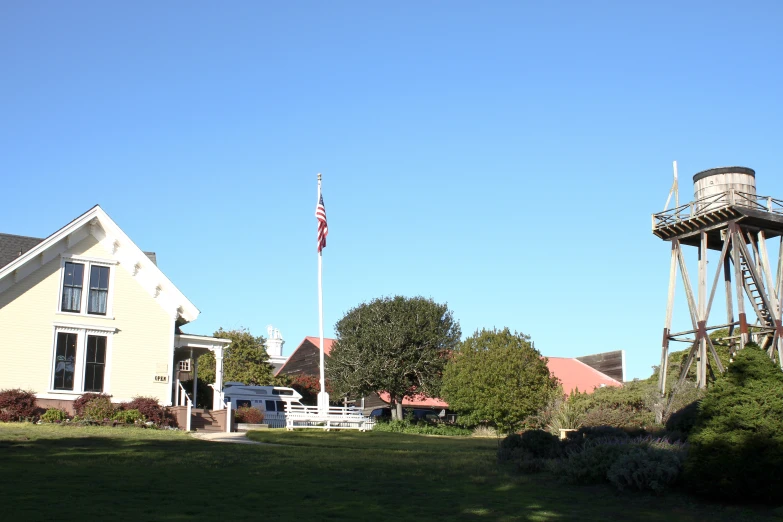 a house with water tower on it's roof