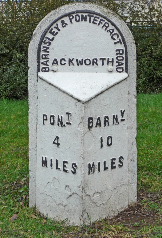 a close up of a memorial in a field