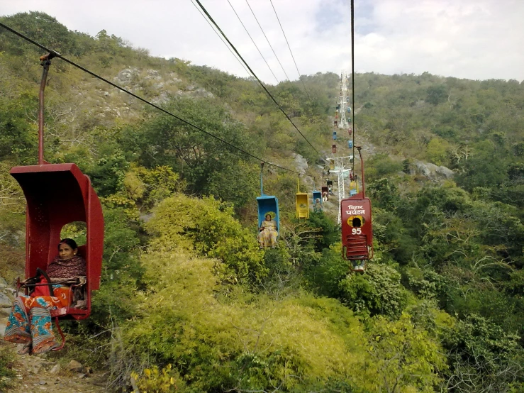 a hill side that has several seats attached