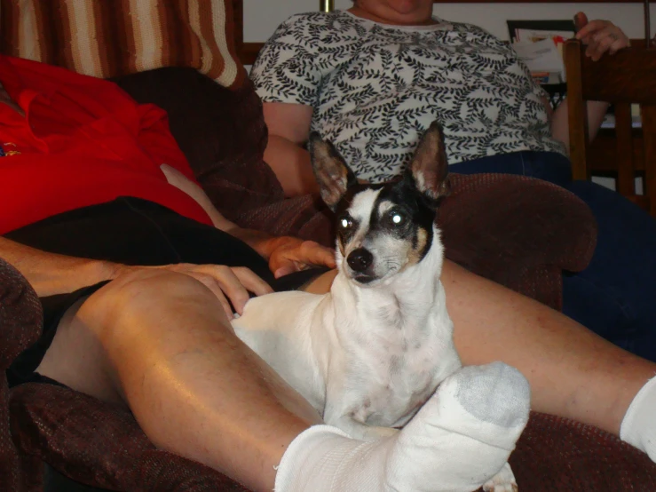 a person with a knee cast on his feet