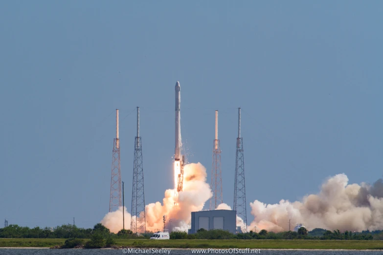 an ariadetic space shuttle launching off from caped island