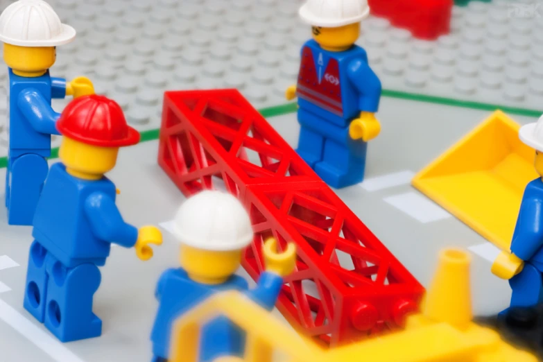 legos are standing around the construction scene made out of bricks