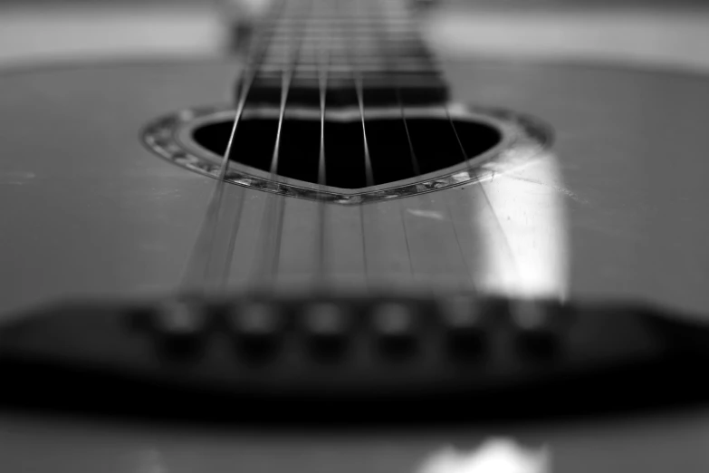 a guitar's frets in black and white