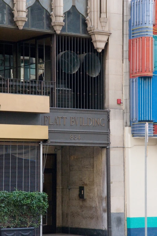 an old building is closed up on the street