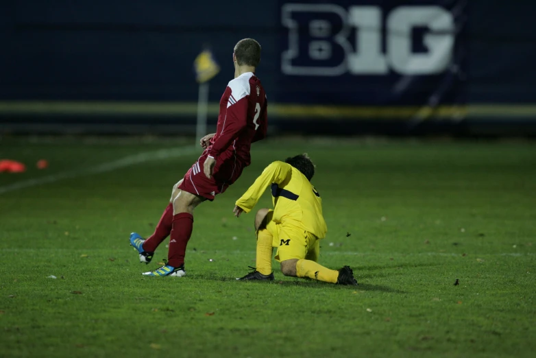 a couple of players from opposing teams during a soccer game