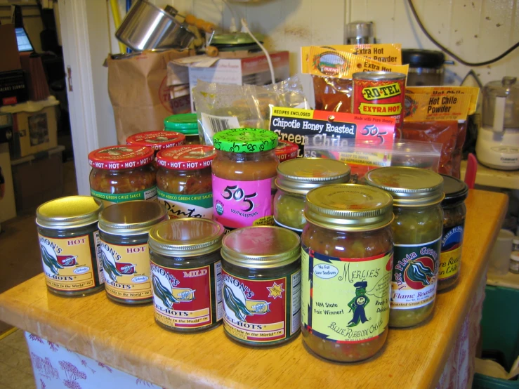 many jars filled with various flavors of paste