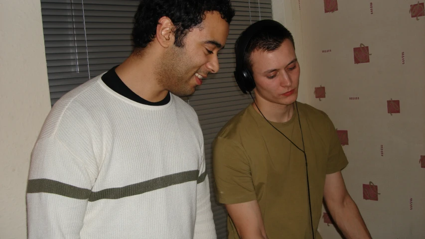 a woman and man standing next to each other