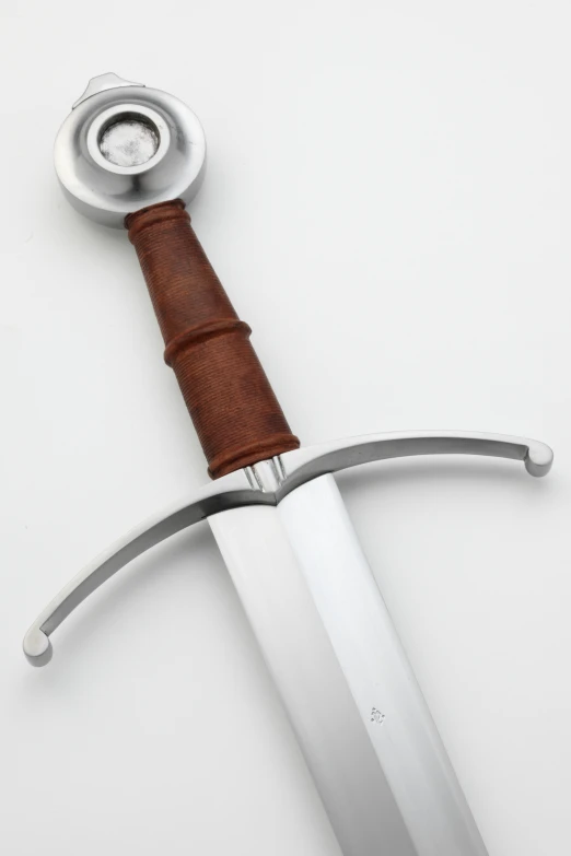 a leather sheathed knife has an eye patch on it